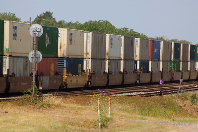 Double-stacked containers passing through Flatonia TX